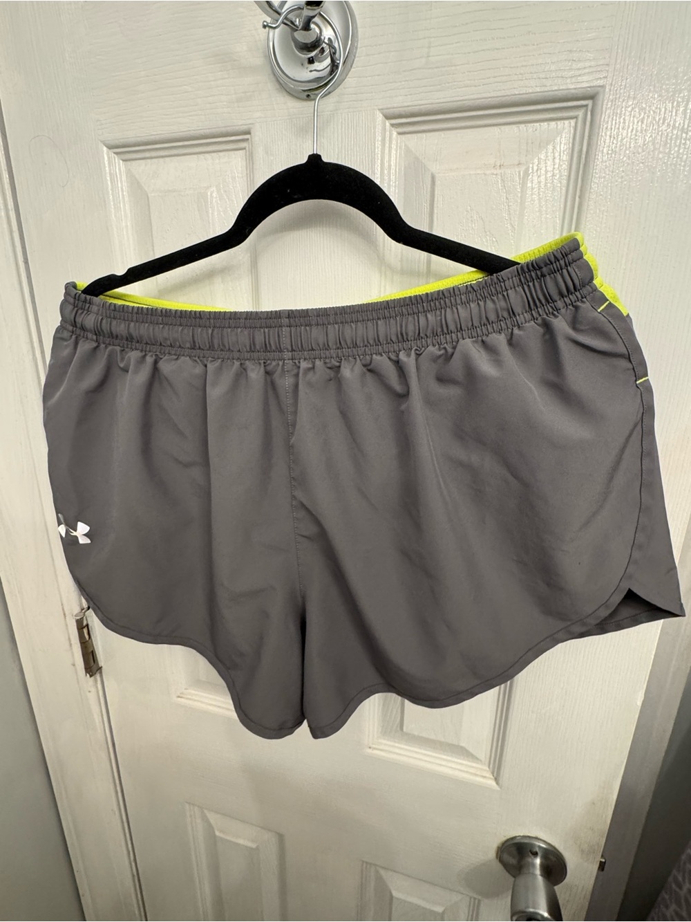 Under Armour Women's Gray Athletic Shorts with Neon Yellow Trim